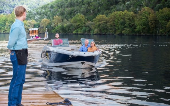 Staff waiting for guests arriving by Lake Austin Water Taxi