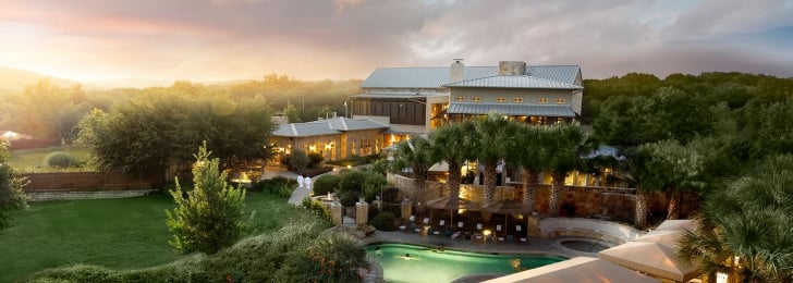 An ariel shot of the Lake Austin Resort Spa grounds at golden hour.