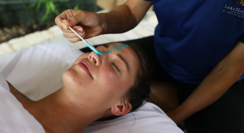 Woman receiving facial at Spa