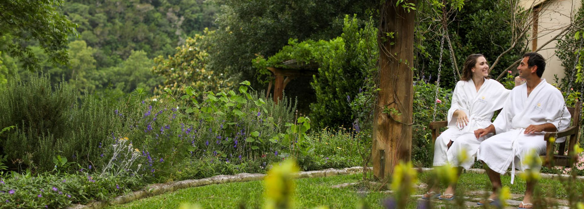 A couple on swing in Lake Austin Spa Resort