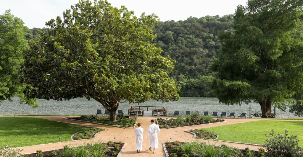 couple walking on magnolia shores