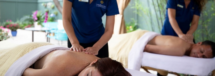 A woman and a man getting a back massage at Lake Austin Spa Resort