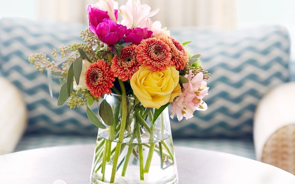 Fresh flowers and appetizers inside the living room.