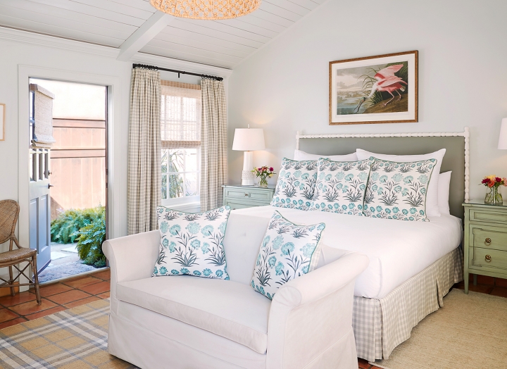 California king bed in the Premier Hot Tub Cottage.