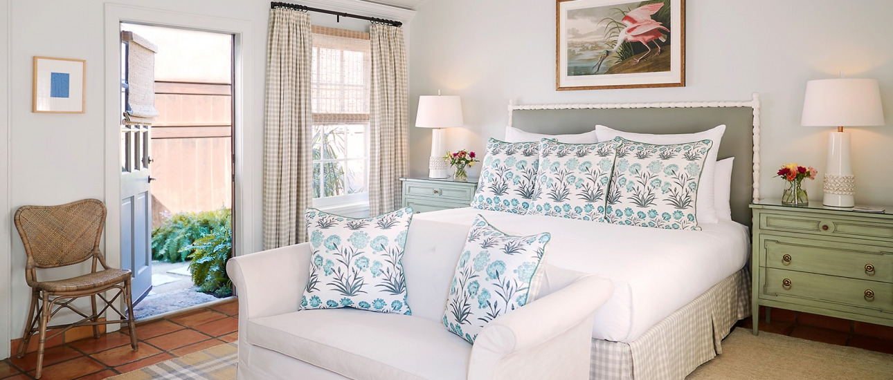 California king bed in the Premier Hot Tub Cottage.