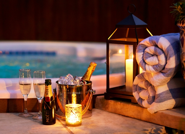 Chilled champagne beside the outdoor hot tub in the Lady Bird Presidential Suite.