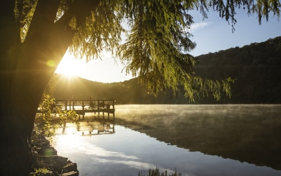 sunrise over yoga dock at Lake Austin Spa Resort