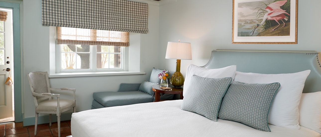 California King Bed with Chair, Lounger under window in Luxury Garden View Room