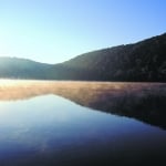 sun rises over Lake Austin