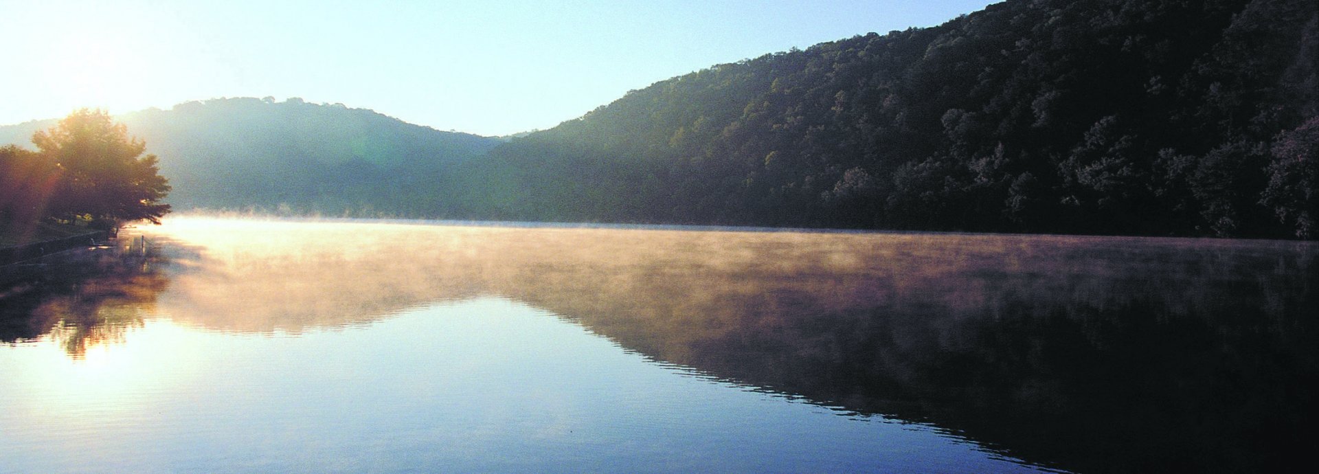 sun rises over Lake Austin