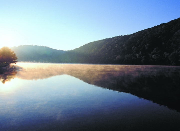 sun rises over Lake Austin
