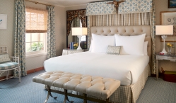 king bed in Lady Bird Suite at Lake Austin Spa Resort