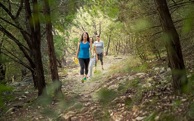 Two women hiking in the woods