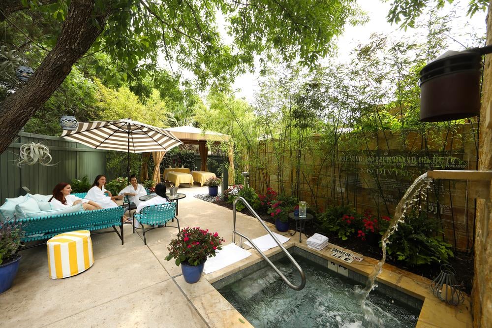 group of ladies in robes on sofa in Bamboo room at Lake Austin Spa Resort