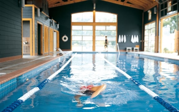 A person swimming in the Pool Barn
