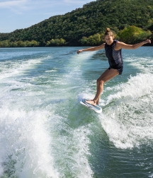 A woman wake surfing
