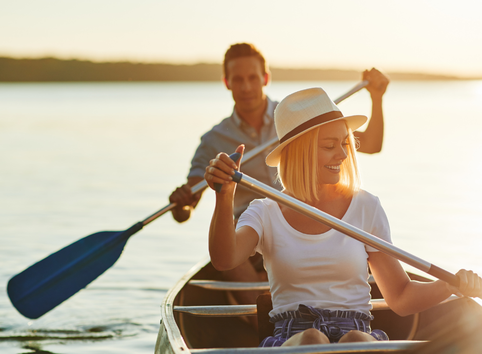 A couple paddling on the lake