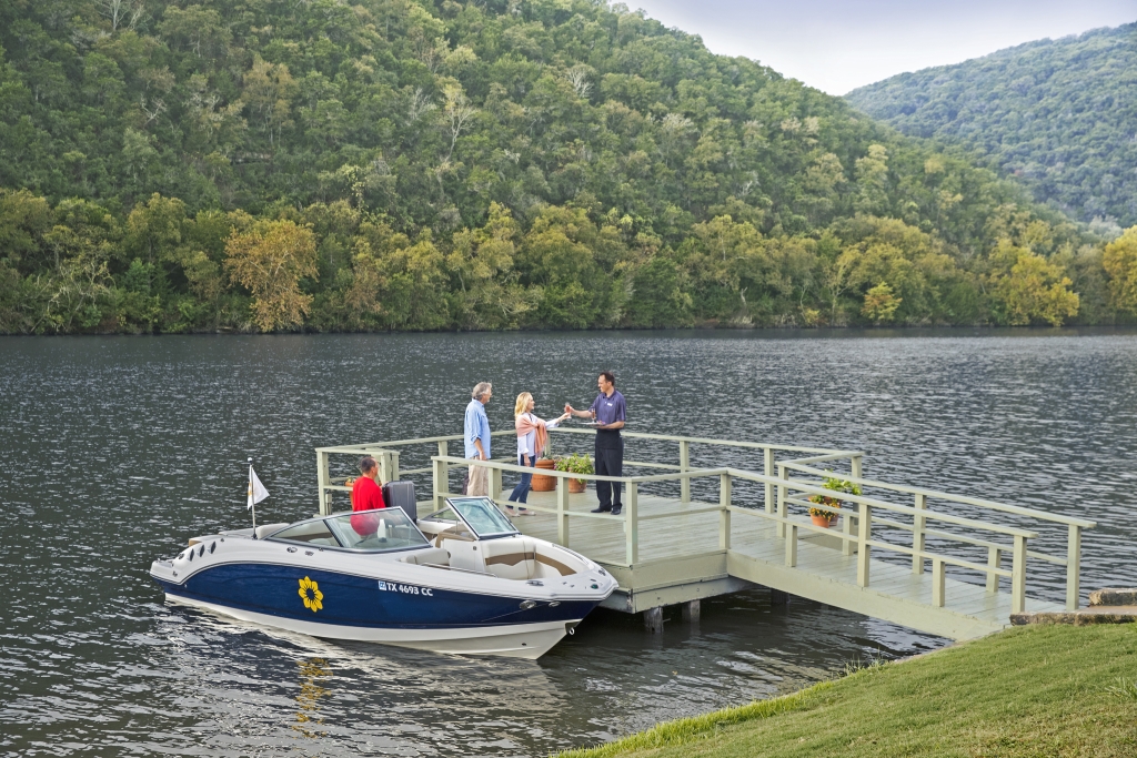 couple arriving at Lake Austin Spa Resort boat dock