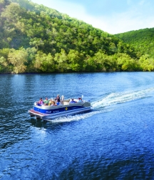 pontoon boat cruising on Lake Austin