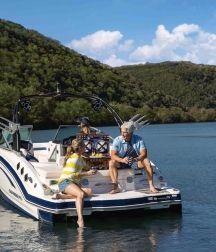 Couple on boat at the lake