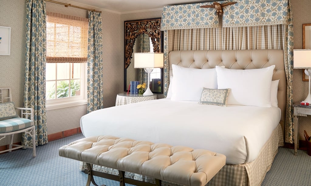 king bed in Lady Bird Suite at Lake Austin Spa Resort