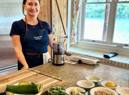 Chef Susie smiling by the blender