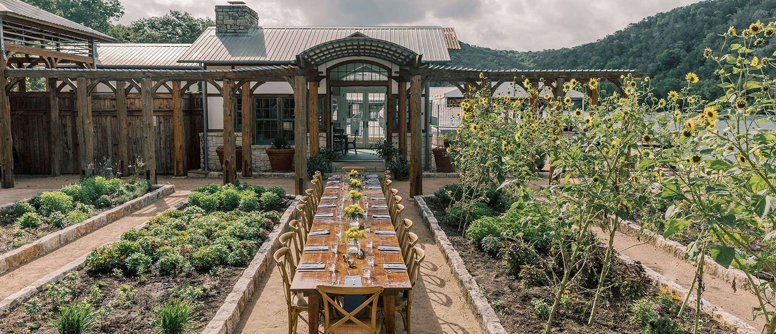 A set of one long table and many chairs in the garden