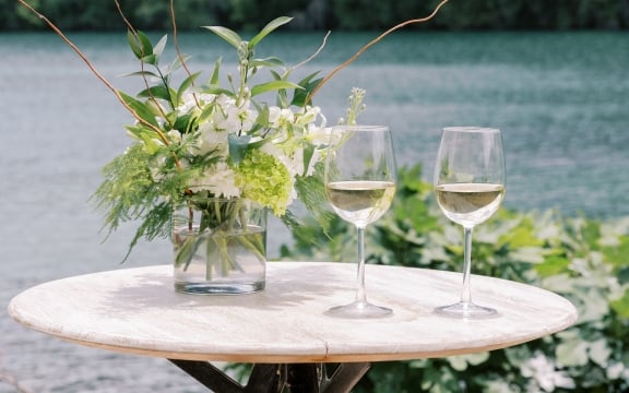 Beautiful table setup with champagne glasses and flowers